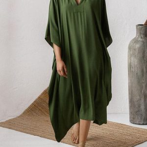 Robe de plage sexy à col en V profond et couleur unie