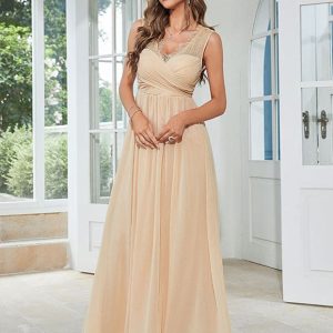 Robe d&rsquo;été élégante en mousseline de soie abricot