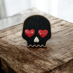 Broche tête de mort noire